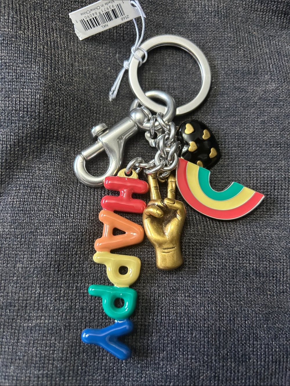 Coach Multicolor 'Happy' Rainbow Keychain with Gold Peace Charm